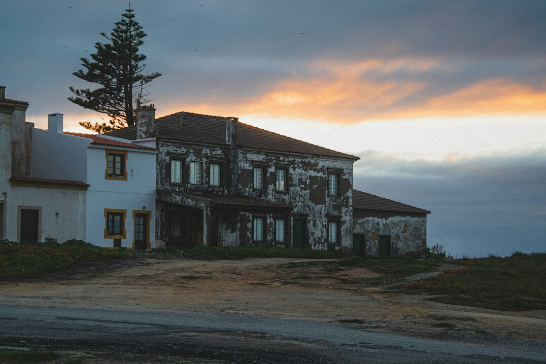old abandoned mansion at dusk